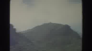 Puerto Rico (1966): View Of Tree Covered Hills Blue Sky And Thin White Clouds