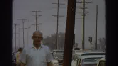Puerto Rico (1966): An Goldman Walking On A Sidewalk Near To Some Cars Parked On