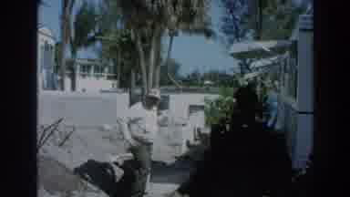 Puerto Rico (1966): Man Showing Off His Mobile Home In Florida Trailer Park With