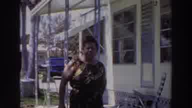 Puerto Rico (1966): A Woman With Handbag And Sunglasses Is Playing Before A White