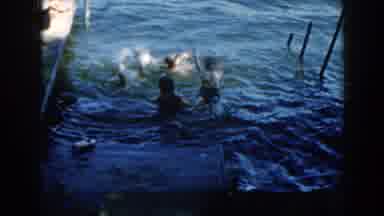 Brighton Michigan (1960): Women Sit And Walk On A Dock With A Ladder As Children