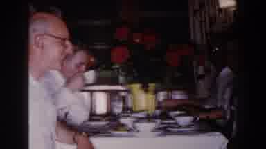Brighton Michigan (1960): Man Wearing White Shirt And Glasses Smiles At Camera