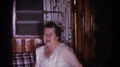 Brighton Michigan (1960): Couple Sitting On The Porch Talking Looking Inside The