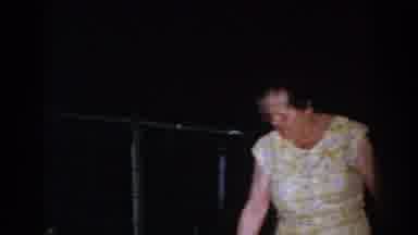 Brighton Michigan (1960): Old Woman Touching The Fountain Water At Her House