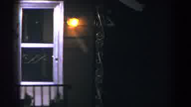 Brighton Michigan (1960): Outside Of A Brown House With Screen Door And White