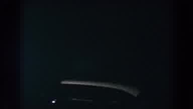 BRIGHTON MICHIGAN-1960: Dark Night Scene with Car Silhouette
