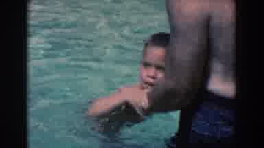 North Hollywood California (1961): Little Boy Learning To Swim With His Parents