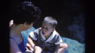 North Hollywood California (1961): Mother And Young Son Chilling During A Day In