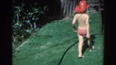 North Hollywood California (1961): A Little Kid Wearing Underpants And A Fireman