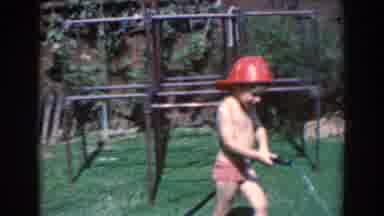 North Hollywood California (1961): A Little Boy Sprays Crops In The Nursery With