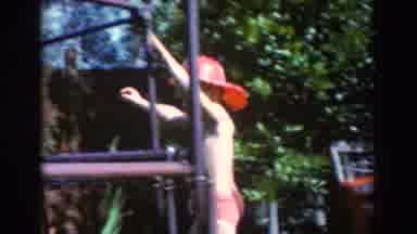 North Hollywood California (1961): A Boy Wearing A Hat Strives To Climb An Iron