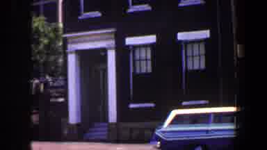 Saint Louis Missouri (1964): View Of Blue Car Parked Near Brown And White Shaded