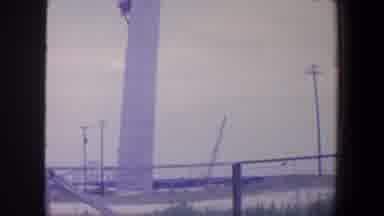 Saint Louis Missouri (1964): Large White Column Surrounded By Power lines Outside