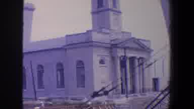 Saint Louis Missouri (1964): Stone Building With Some Wooden Pews On The Outside