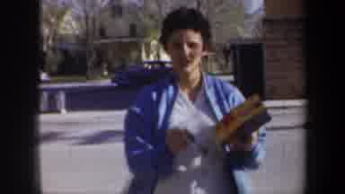 Wyoming (1957): Girl In Blue Weather And White Shirt Walks Toward The Camera While
