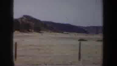 Wyoming (1957): Drive Through Countryside Showing Landscape Mountains Hills Clouds