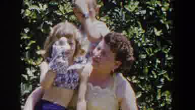 Lubbock Texas (1953): Young Girl Sits On A Woman's Lab Playing With A Hand Puppet