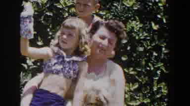Lubbock Texas (1953): Children And Mother Trying To Pose For A Picture With A