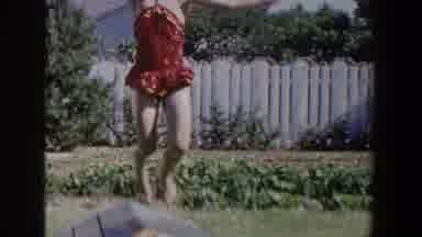 Lubbock Texas (1953): Little Girl In Red Bathing And Swimming Cap Jumps Into Water