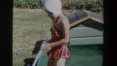 Lubbock Texas (1953): Baby Girl Wearing Red Colour Dress Having Fun In Portable