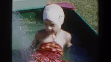 Lubbock Texas (1953): Girl Swimming In A Pool And Then Playing Then Looking At The