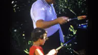 Lubbock Texas (1953): A Dad Roasting Food With His Son As A Way To Teach Him