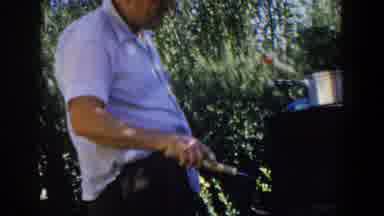Lubbock Texas (1953): A Lord Cooks On A Wood Stove And A Girl Runs Near The