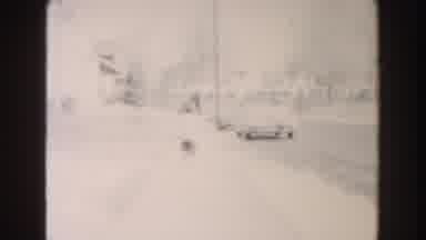 Dearborn Michigan (1961): Child In Winter Hat Runs Down Sidewalk Past Vintage Car