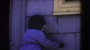 Dearborn Michigan (1961): Kid Is Almost Falling Down While Trying To Walk In