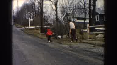 Dearborn Michigan (1961): A Mother Trying To Catch Her Boy Who Is Dodging Her