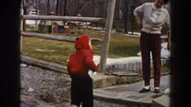 Dearborn Michigan (1961): A Little Boy With A Red Coat Complains To His Mother