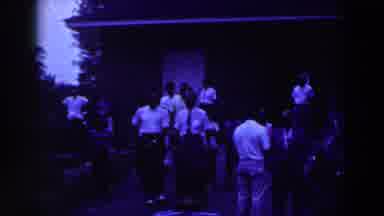 Ridgefield New Jersey (1961): People Wearing White Shirts Walking Away From White