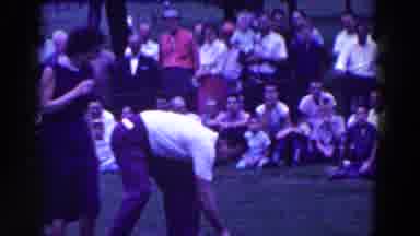 Ridgefield New Jersey (1961): Man Wearing Brown Pants Picks Up Golf Club On A