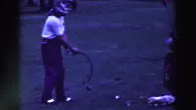 Ridgefield New Jersey (1961): A Man Is Playing Golf With A Broken Putter In A Dark