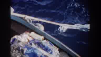GIBRALTAR-1959: Paddling A Canoe Steadily In The Middle Of The Ocean