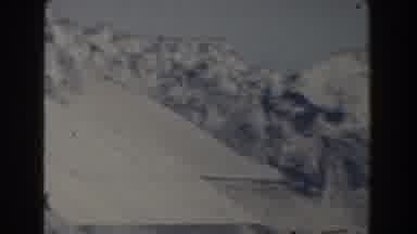 GIBRALTAR-1959: Footage Of Big Mountains Covered By Snow Near The Ocean