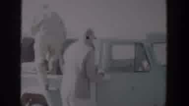 Lubbock Texas (1957): Men With Hunting Rifles Getting Into A Pickup Truck