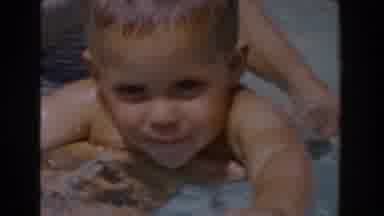 Van Nuys California (1962): Woman Wearing White Swim Cap Holds Toddler In Pool On