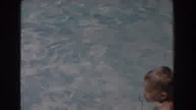 Van Nuys California (1962): Dad Helps His Baby Son Swim