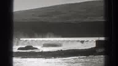 Washington (1939): Black And White Footage Of Dam Water Dropping During Day