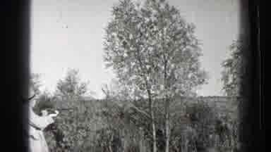 Washington (1939): A Boy And A Father Eating At The Grassland