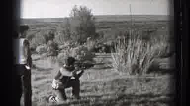 Washington (1939): Three Men Shooting Shotgun In Desert Lining Shot Preparing To