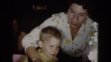 North Hollywood California (1961): Happy Woman Cutting Son's Birthday Cake At
