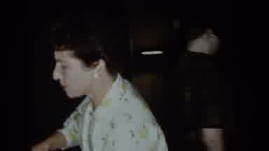 North Hollywood California (1961): A Woman Cooks For Her Son As He Keeps Her