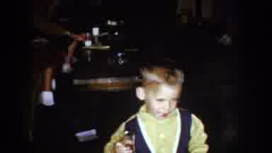 North Hollywood California (1961): Well Dressed Baby Drinks At The Bar While