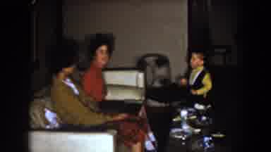 North Hollywood California (1961): Woman Wearing Red Dress Hold Small Boy Wearing