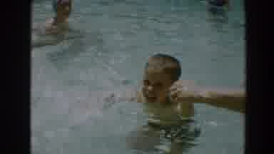 North Hollywood California (1961): A Mother Teaches Her Son To Swim In The Outdoor