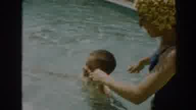North Hollywood California (1961): Mother And Son Play Together At A Pool On A