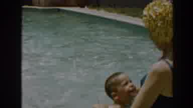 North Hollywood California (1961): A Boy And Woman In A Pool The Boy Is Jumping