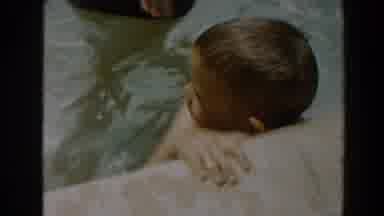 North Hollywood California (1961): Young Boy Dipping His Toes In A Pool And